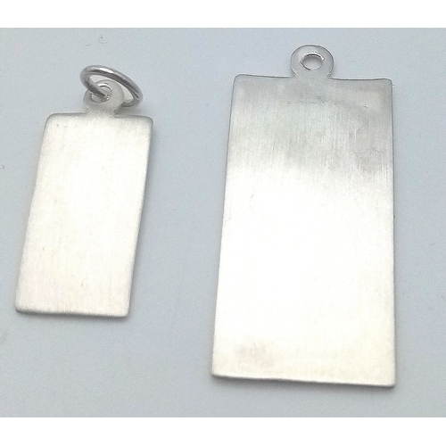 1693 - 2 X STERLING SILVER RECTANGULAR ST CHRISTOPHERS. 2.8cm and 3.4cm length. 6.1g total weight. Ref: SC ... 