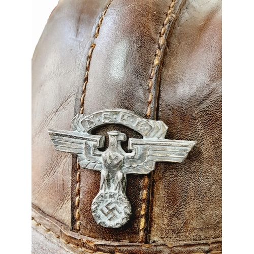 363 - Early 1930’s German Motorcycle Crash Helmet and liner with an NSKK Badge on the front.