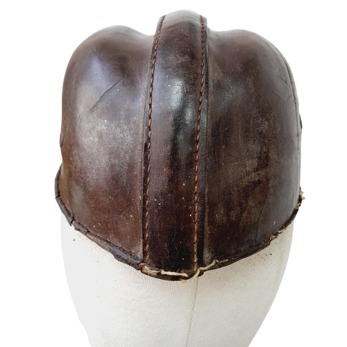 363 - Early 1930’s German Motorcycle Crash Helmet and liner with an NSKK Badge on the front.