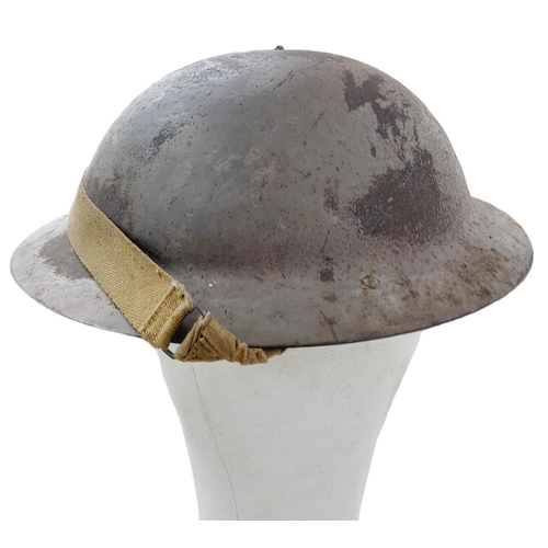 337 - Rare 1941 Dated WW2 British Raw Edge Mk II Helmet. These were made by Briggs Motor Bodies Ltd
of Dag... 