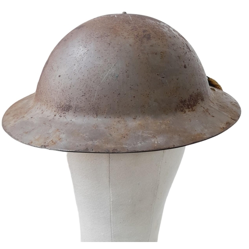 337 - Rare 1941 Dated WW2 British Raw Edge Mk II Helmet. These were made by Briggs Motor Bodies Ltd
of Dag... 