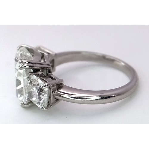 100 - A Breathtaking 4.01ct GIA Certified Diamond Ring. A brilliant cushion cut 4.01ct central diamond of ... 