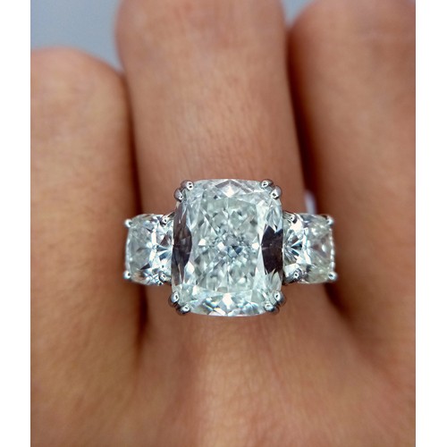 100 - A Breathtaking 4.01ct GIA Certified Diamond Ring. A brilliant cushion cut 4.01ct central diamond of ... 