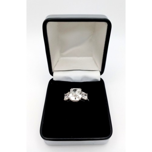 100 - A Breathtaking 4.01ct GIA Certified Diamond Ring. A brilliant cushion cut 4.01ct central diamond of ... 