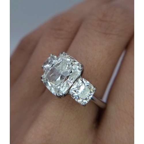 100 - A Breathtaking 4.01ct GIA Certified Diamond Ring. A brilliant cushion cut 4.01ct central diamond of ... 