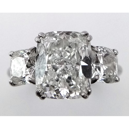 100 - A Breathtaking 4.01ct GIA Certified Diamond Ring. A brilliant cushion cut 4.01ct central diamond of ... 