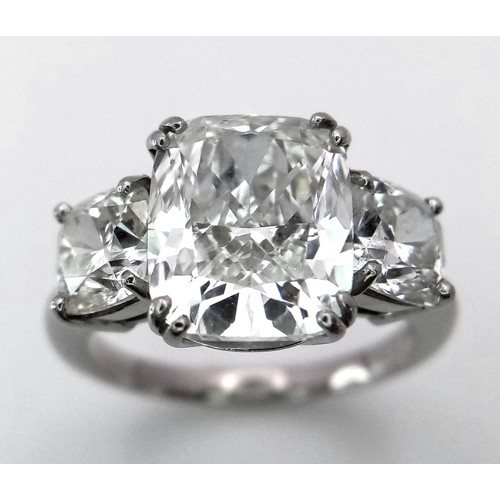 100 - A Breathtaking 4.01ct GIA Certified Diamond Ring. A brilliant cushion cut 4.01ct central diamond of ... 