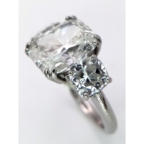 100 - A Breathtaking 4.01ct GIA Certified Diamond Ring. A brilliant cushion cut 4.01ct central diamond of ... 