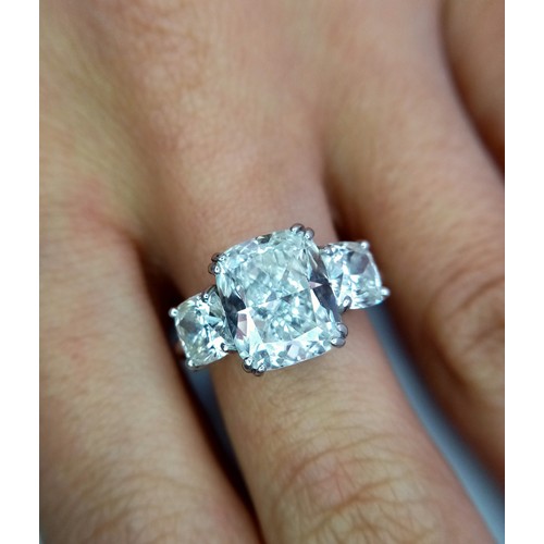 100 - A Breathtaking 4.01ct GIA Certified Diamond Ring. A brilliant cushion cut 4.01ct central diamond of ... 