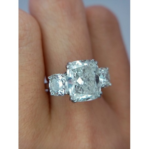 100 - A Breathtaking 4.01ct GIA Certified Diamond Ring. A brilliant cushion cut 4.01ct central diamond of ... 