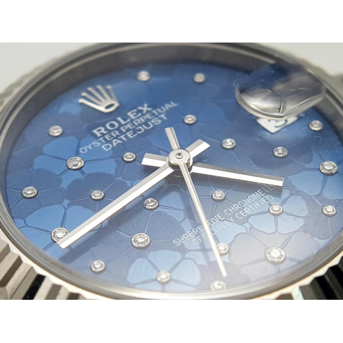 102 - A Beautiful Rolex Datejust Blue Floral Motif (with diamonds) Ladies Watch. Stainless steel bracelet ... 