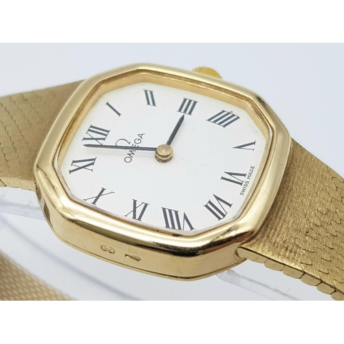 149 - A Beautiful Vintage Omega 9K Gold Ladies Mechanical Watch. 9k gold bracelet and case - 23mm. White d... 