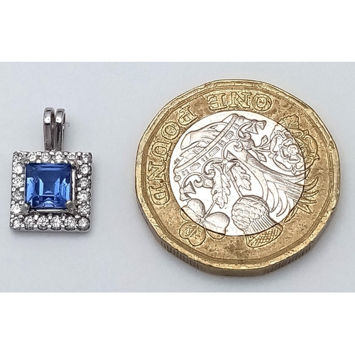 210 - A 18K (TESTED AS)  WHITE GOLD DIAMOND & SAPPHIRE PENDANT 1.02CT SAPPHIRE 1.6G. 14mm x 9mm.

BL 9003