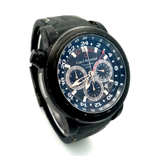 303 - A Carl F. Bucherer Travel Tec GMT Chronograph Automatic Gents Watch. Black vulcanised rubber strap. ... 