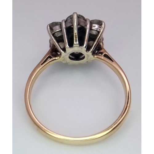 348 - A 9K YELLOW GOLD STONE SET VINTAGE CLUSTER RING. Size O, 3.4g total weight. Ref: SC 9001