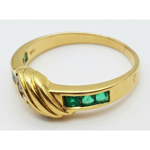 492 - AN 18K YELLOW GOLD DIAMOND & EMERALD RING. Size J, 2.3g total weight. Ref: SC 9052