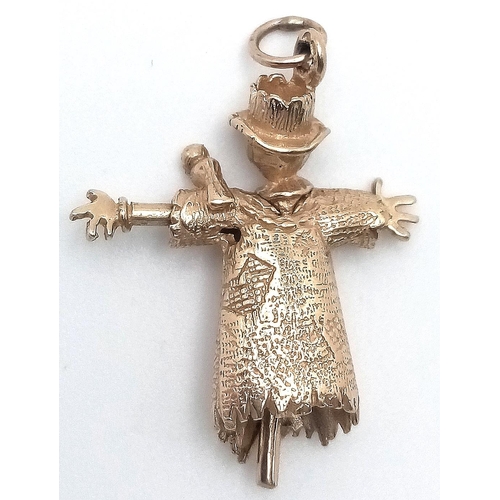 506 - A 9K YELLOW GOLD SCARECROW CHARM WITH MOVING PARTS. 28mm length, 3.2g weight. Ref: SC 9056