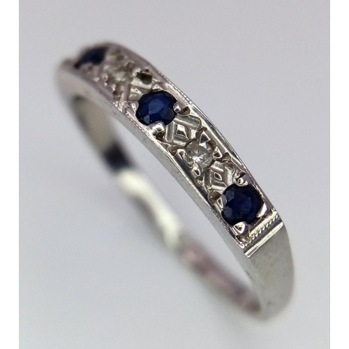 544 - A 9K WHITE GOLD DIAMOND & SAPPHIRE BAND RING 2G SIZE N

SPAS 9004