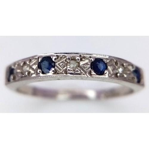 544 - A 9K WHITE GOLD DIAMOND & SAPPHIRE BAND RING 2G SIZE N

SPAS 9004