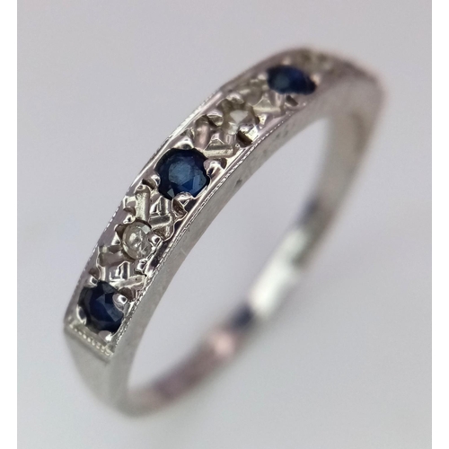 544 - A 9K WHITE GOLD DIAMOND & SAPPHIRE BAND RING 2G SIZE N

SPAS 9004