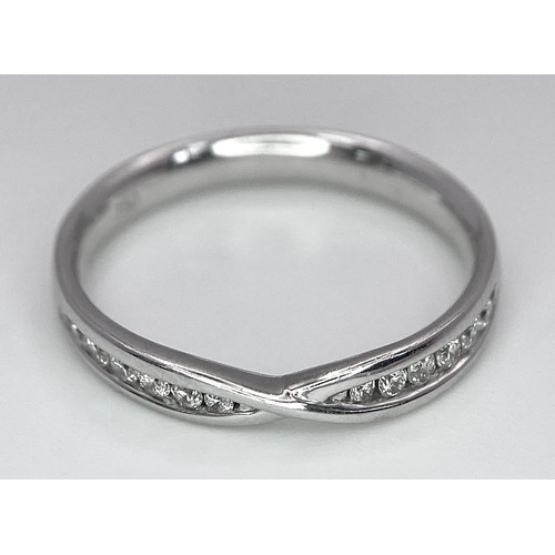 277 - A 18K WHITE GOLD DIAMOND RING 2.9G SIZE N 1/2 0.20CT

BL 9005