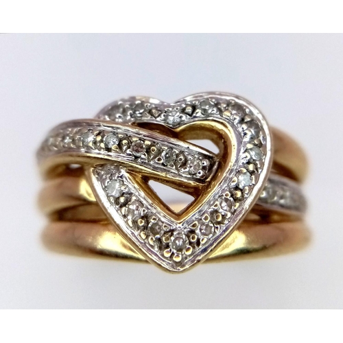 151 - A 9K YELLOW GOLD DIAMOND SET HEART RING 5.6G SIZE M 1/2.

SC 9096