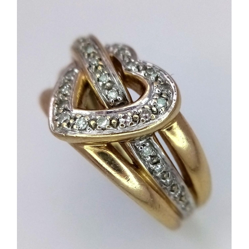 151 - A 9K YELLOW GOLD DIAMOND SET HEART RING 5.6G SIZE M 1/2.

SC 9096