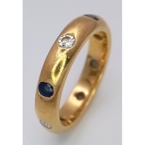 26 - A 18K YELLOW GOLD DIAMOND & SAPPHIRE SET BAND RING 0.20CT DIAMONDS & 0.25CT SAPPHIRES 5.5G SIZE K.

... 