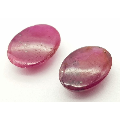 314 - A PAIR OF CABOCHON RUBIES 3.06CT 0.63g

A/S 1031