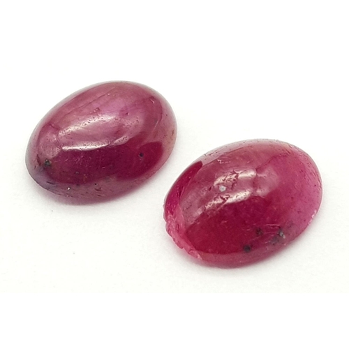 314 - A PAIR OF CABOCHON RUBIES 3.06CT 0.63g

A/S 1031