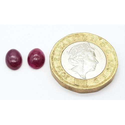 314 - A PAIR OF CABOCHON RUBIES 3.06CT 0.63g

A/S 1031