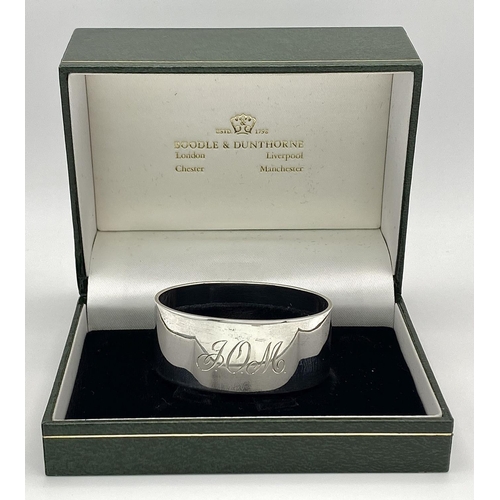 495 - A Sterling Silver Engraved Oval Napkin Ring from Boodles and Dunthorne, in original box, Christening... 