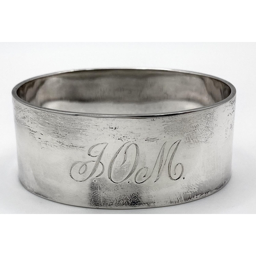 495 - A Sterling Silver Engraved Oval Napkin Ring from Boodles and Dunthorne, in original box, Christening... 