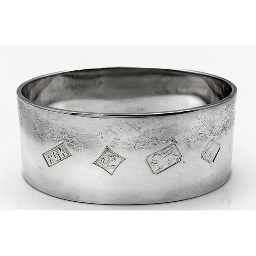 495 - A Sterling Silver Engraved Oval Napkin Ring from Boodles and Dunthorne, in original box, Christening... 