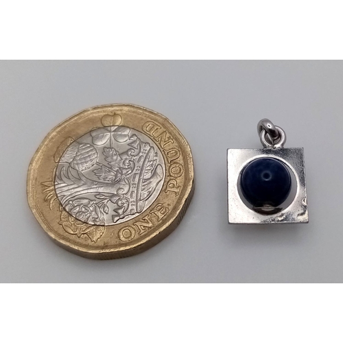 509 - A 14ct white gold (tested as) lapis lazuli pendant, 1.1g , 10cm x 17cm.

ref: BM06