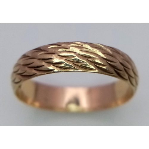 523 - A 9ct Yellow Gold Patterned Band Ring, size M, 2.1g total weight.

ref: 1518I