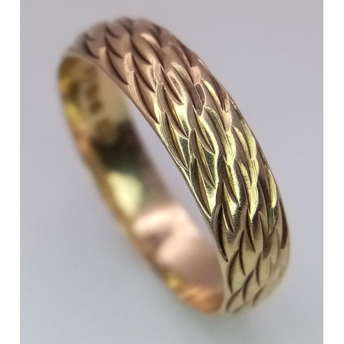 523 - A 9ct Yellow Gold Patterned Band Ring, size M, 2.1g total weight.

ref: 1518I