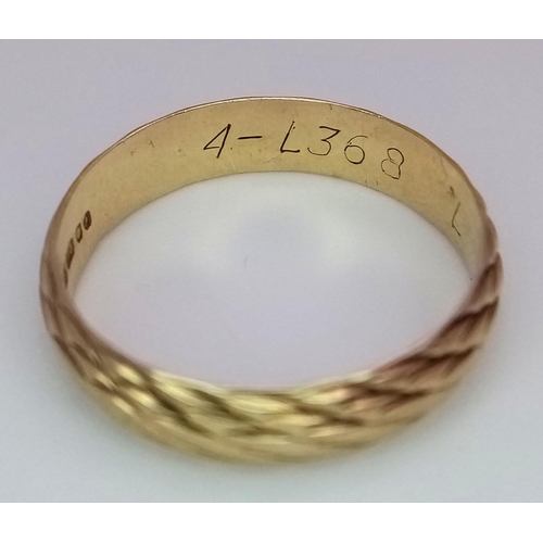 523 - A 9ct Yellow Gold Patterned Band Ring, size M, 2.1g total weight.

ref: 1518I