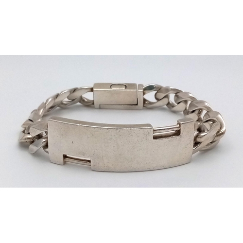 530 - A Sterling Silver ID Bracelet, 12” length, 68.8g total weight.

ref: 1493I