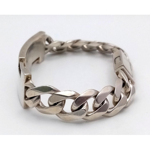 530 - A Sterling Silver ID Bracelet, 12” length, 68.8g total weight.

ref: 1493I