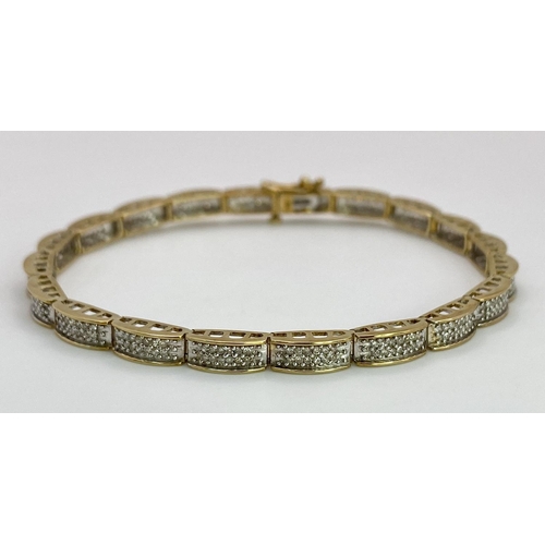 68 - A 9K YELLOW GOLD DIAMOND SET BRACELET 1CT 10.1G , 18.8cm length.

SC 9027