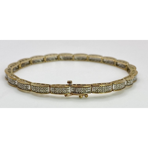 68 - A 9K YELLOW GOLD DIAMOND SET BRACELET 1CT 10.1G , 18.8cm length.

SC 9027