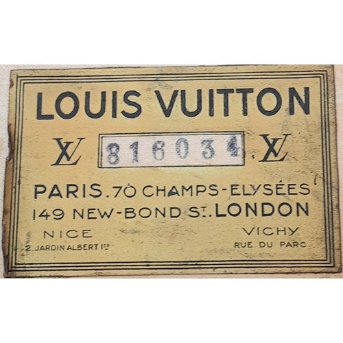 255 - A Vintage Possibly Antique Louis Vuitton Trunk/Hard Suitcase. Canvas monogram LV exterior with quatr... 