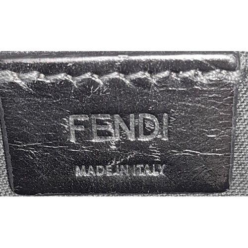 170 - A Fendi Black, Grey and Yellow Diagonal Men's Clutch/Pouch. Leather and canvas exterior with silver-... 