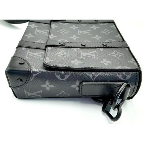 2 - A Louis Vuitton Black Eclipse Trunk Messenger Bag. Monogramed canvas exterior with black-toned hardw... 