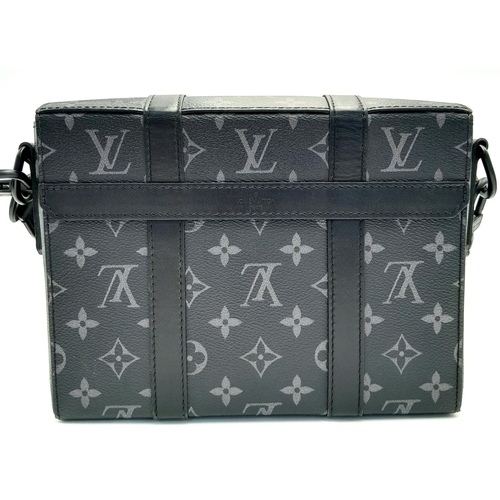 2 - A Louis Vuitton Black Eclipse Trunk Messenger Bag. Monogramed canvas exterior with black-toned hardw... 