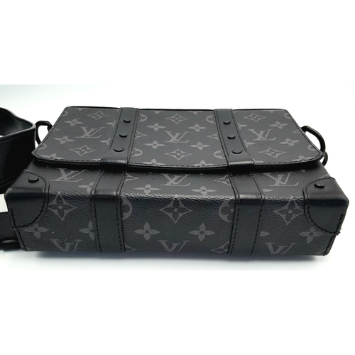 2 - A Louis Vuitton Black Eclipse Trunk Messenger Bag. Monogramed canvas exterior with black-toned hardw... 