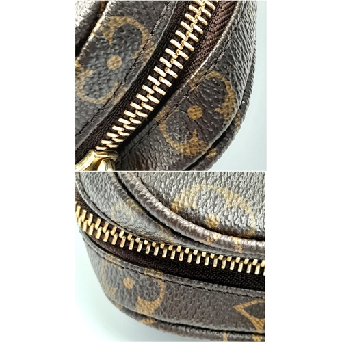 215 - A Louis Vuitton Trotteur Beaubourg Satchel Bag. Monogramed canvas exterior with gold-toned hardware,... 