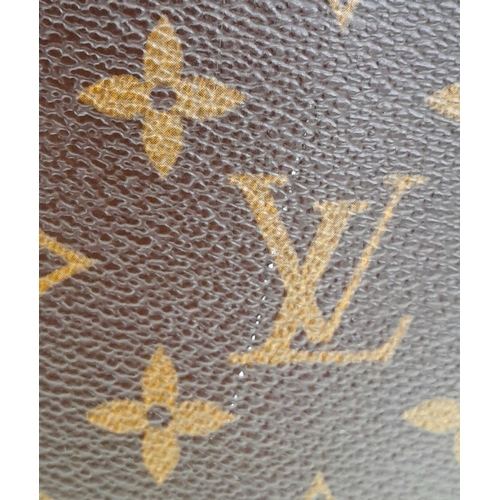 222 - A Louis Vuitton Vavin GM Tote Bag. Monogramed canvas exterior with gold-toned hardware and two leath... 