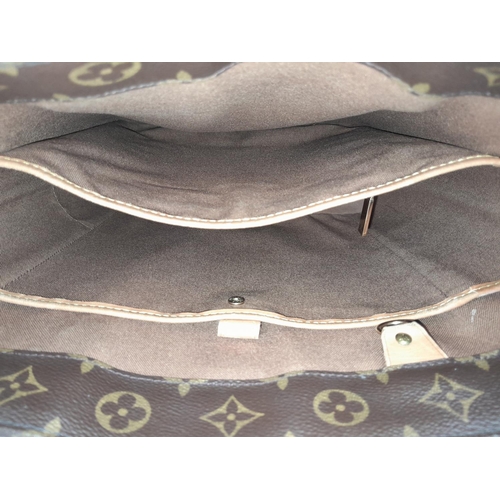 222 - A Louis Vuitton Vavin GM Tote Bag. Monogramed canvas exterior with gold-toned hardware and two leath... 